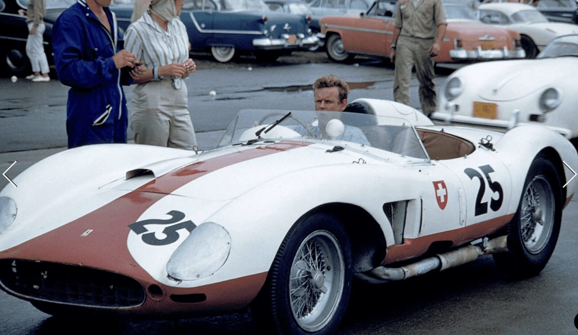 Vintage race car with number 25 on track.