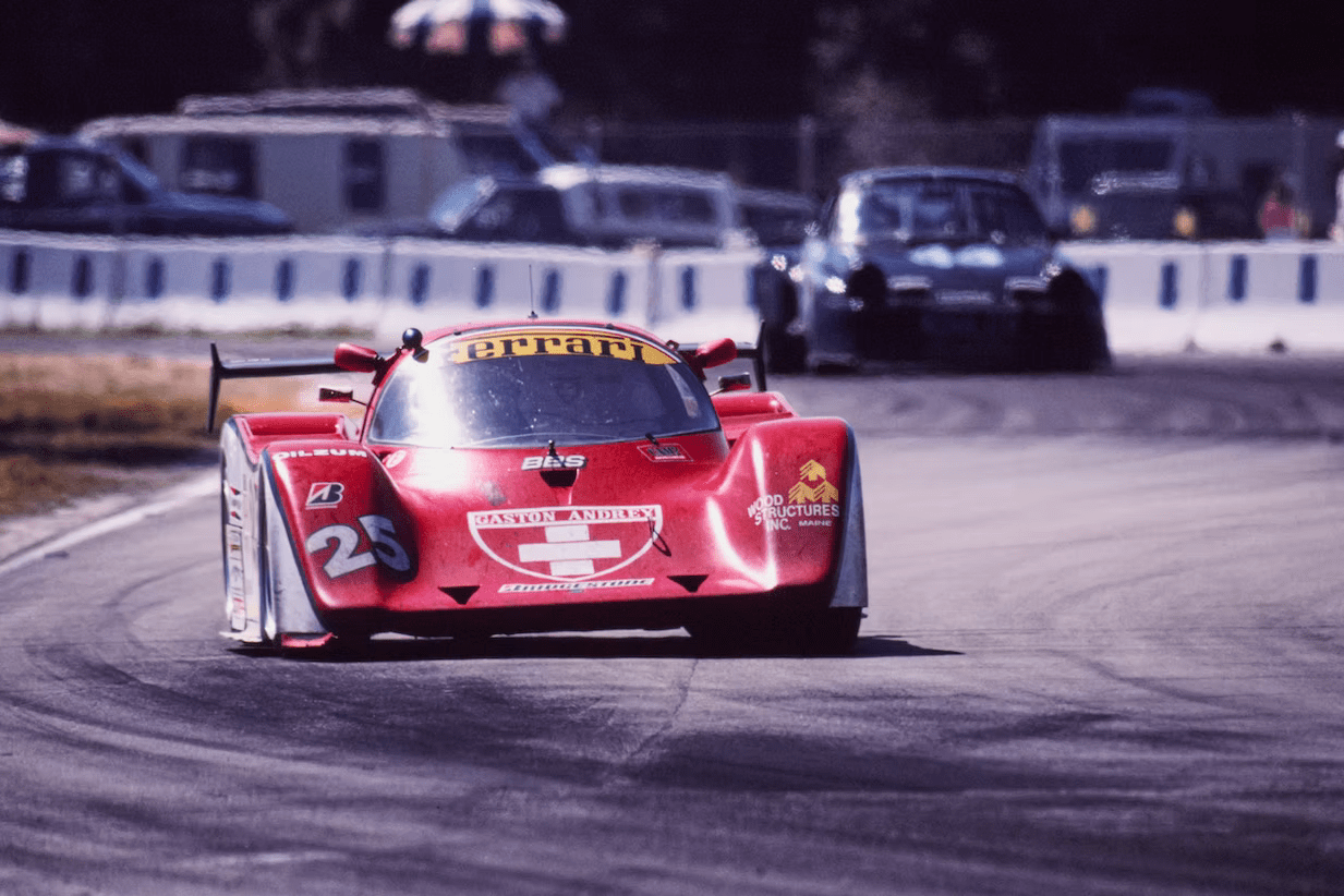 Red race car on track