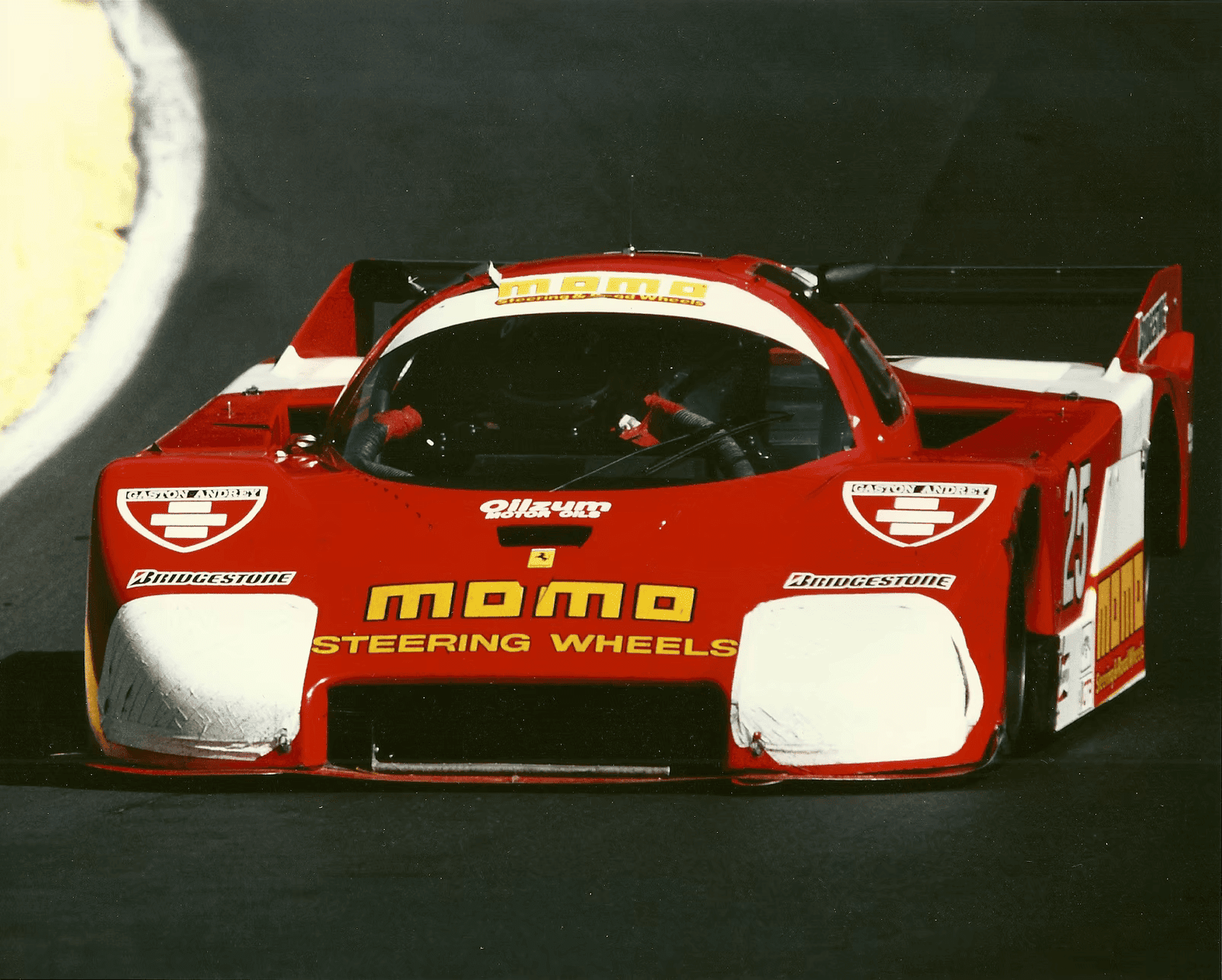Momo-branded car in motion