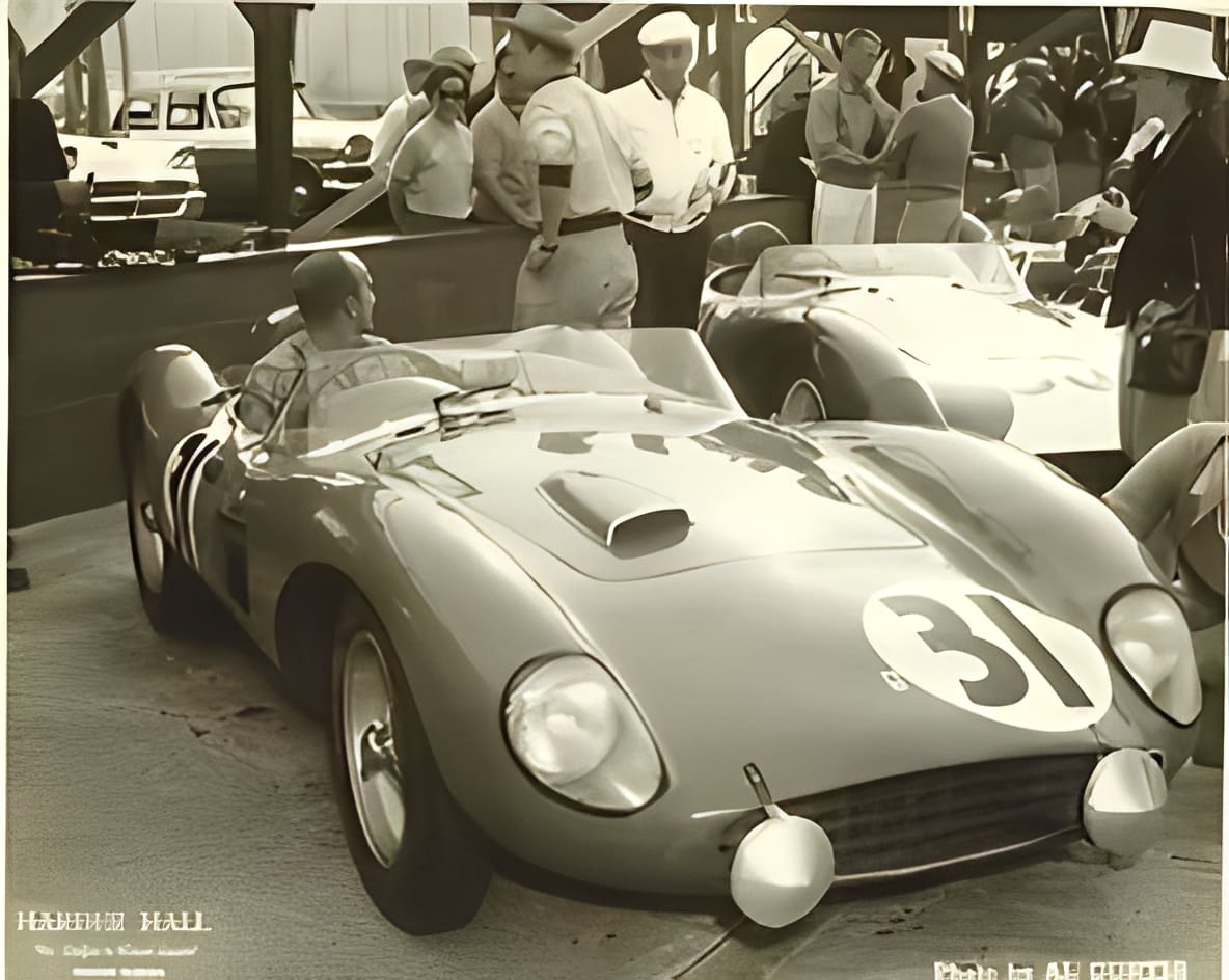 Classic sports car in pit area