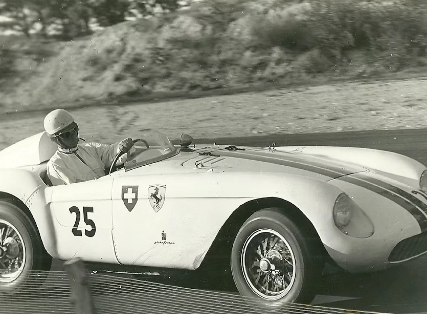 Vintage race car speeding on track
