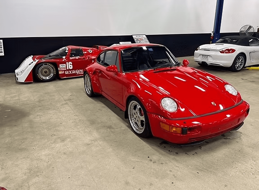 Red sports cars in a garage