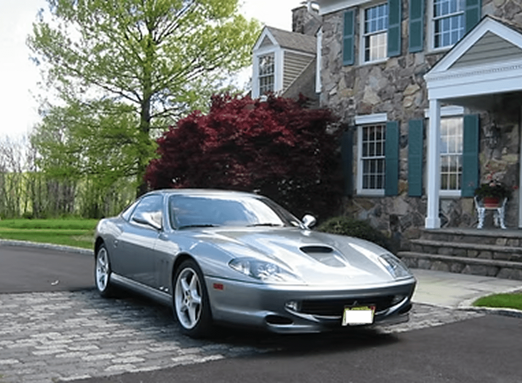 Luxury car in residential driveway