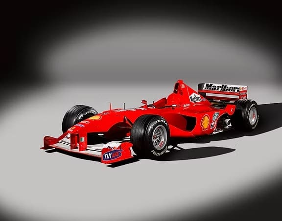 Vintage Formula 1 car in spotlight