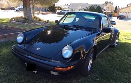 Classic car in residential neighborhood