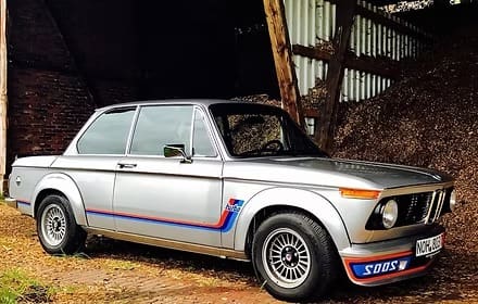 Retro vehicle in rustic setting