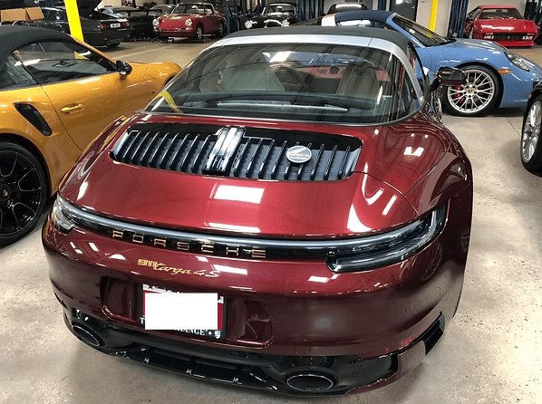 Red Porsche parked indoors