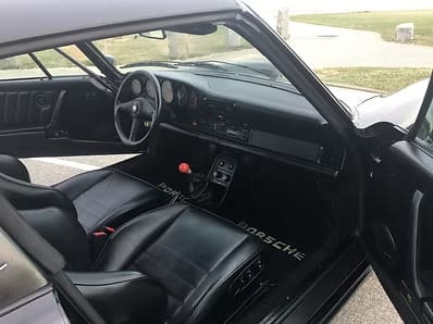 Vintage car dashboard and steering wheel