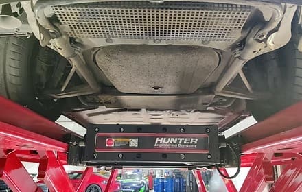Auto repair lift with car above