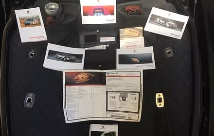 Automotive documents and keys arrangement