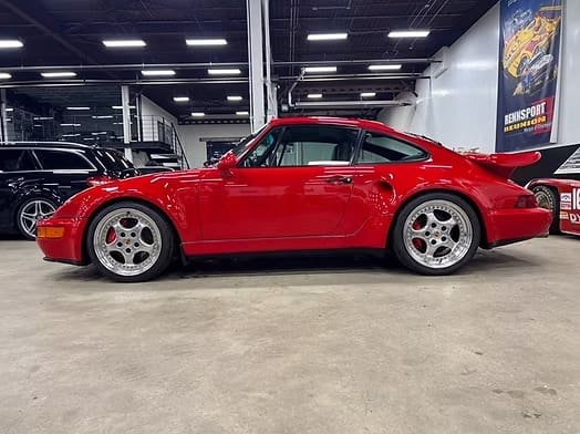 Red sports car in showroom