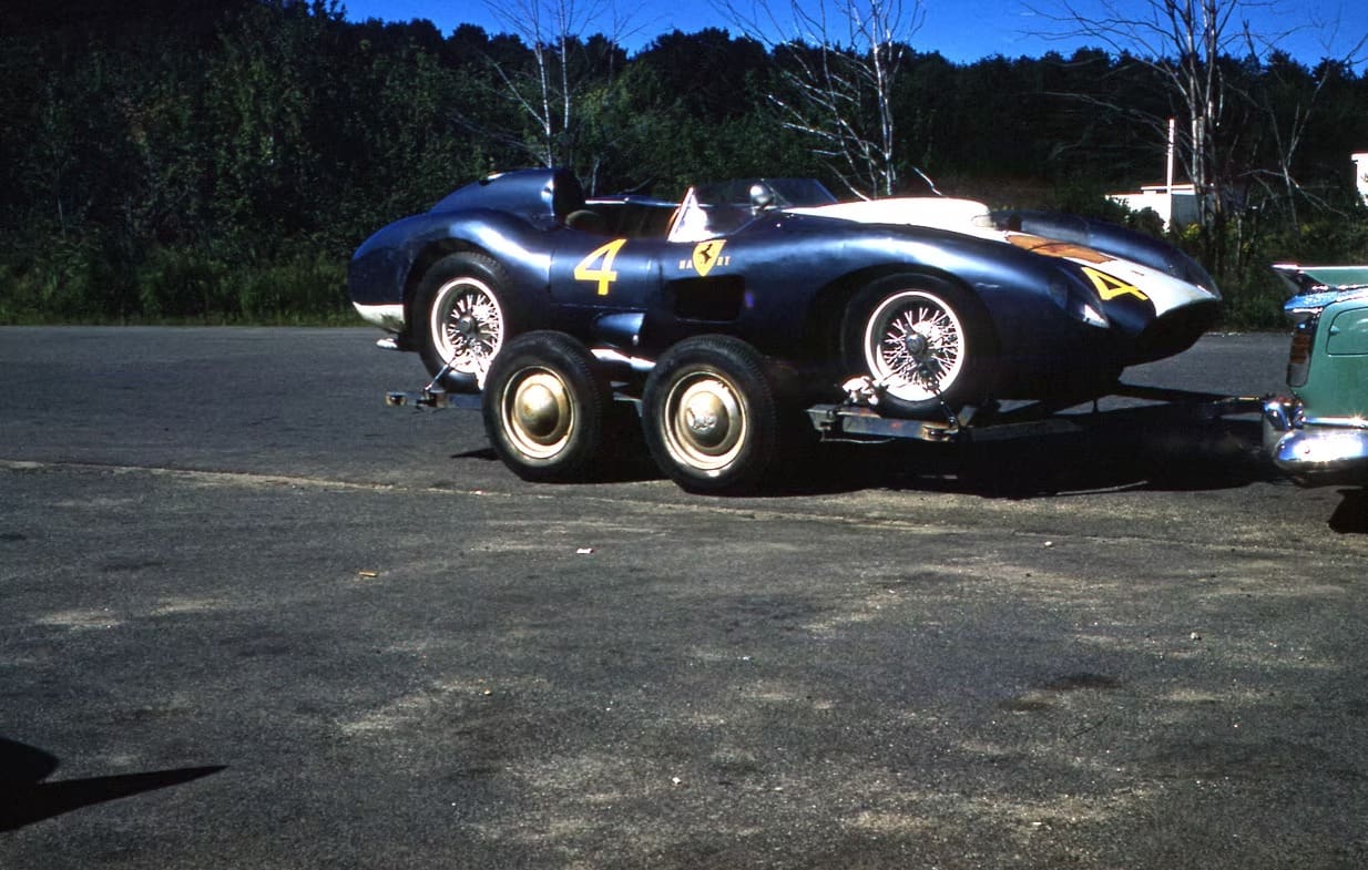Blue race car with number four