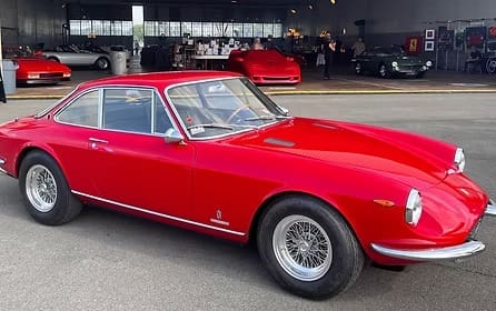 Red vintage sports car in garage