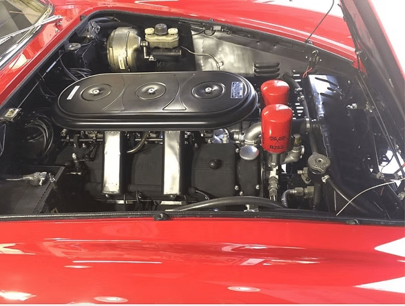 Vintage engine with red accents