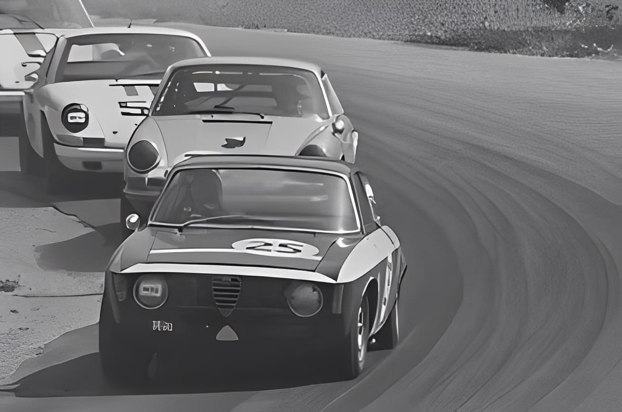 Vintage cars racing in monochrome
