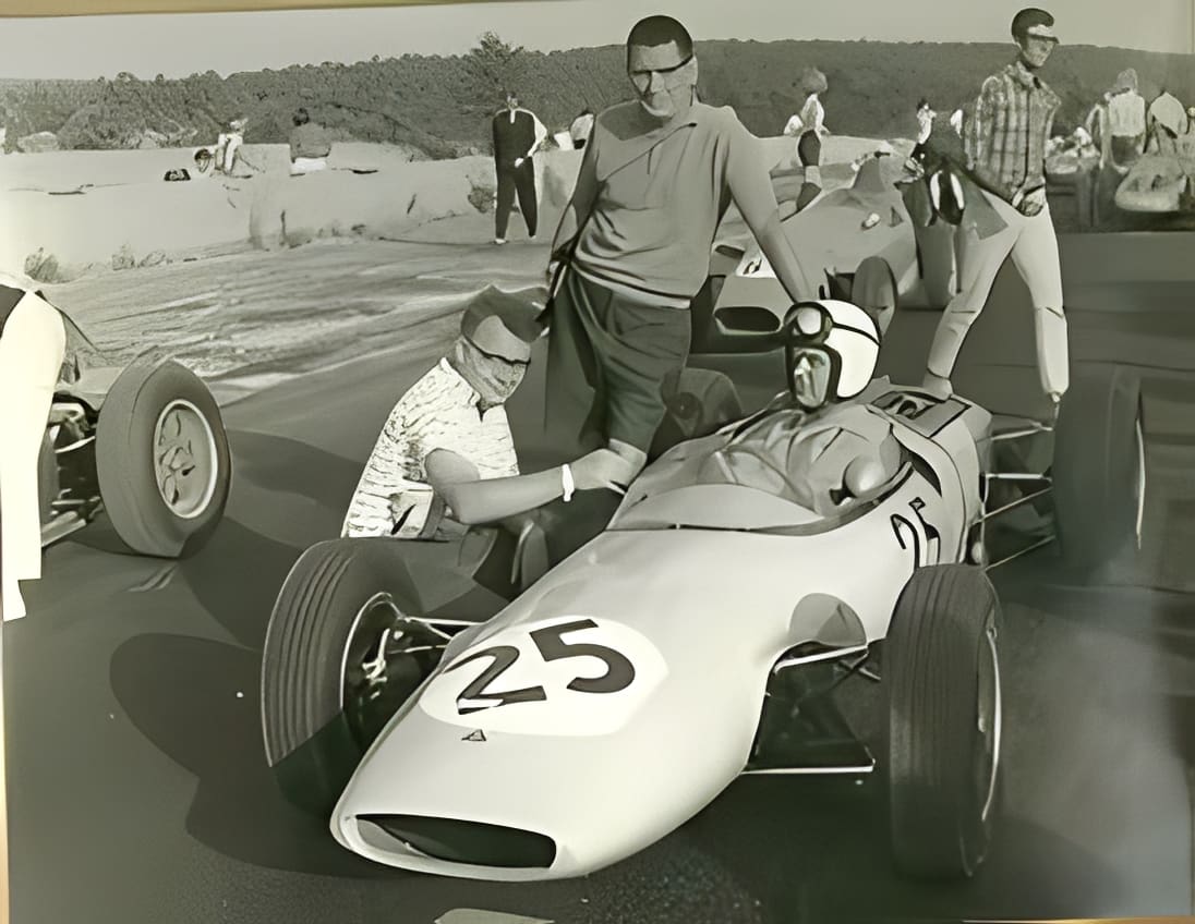 Classic motorsport scene with race crew