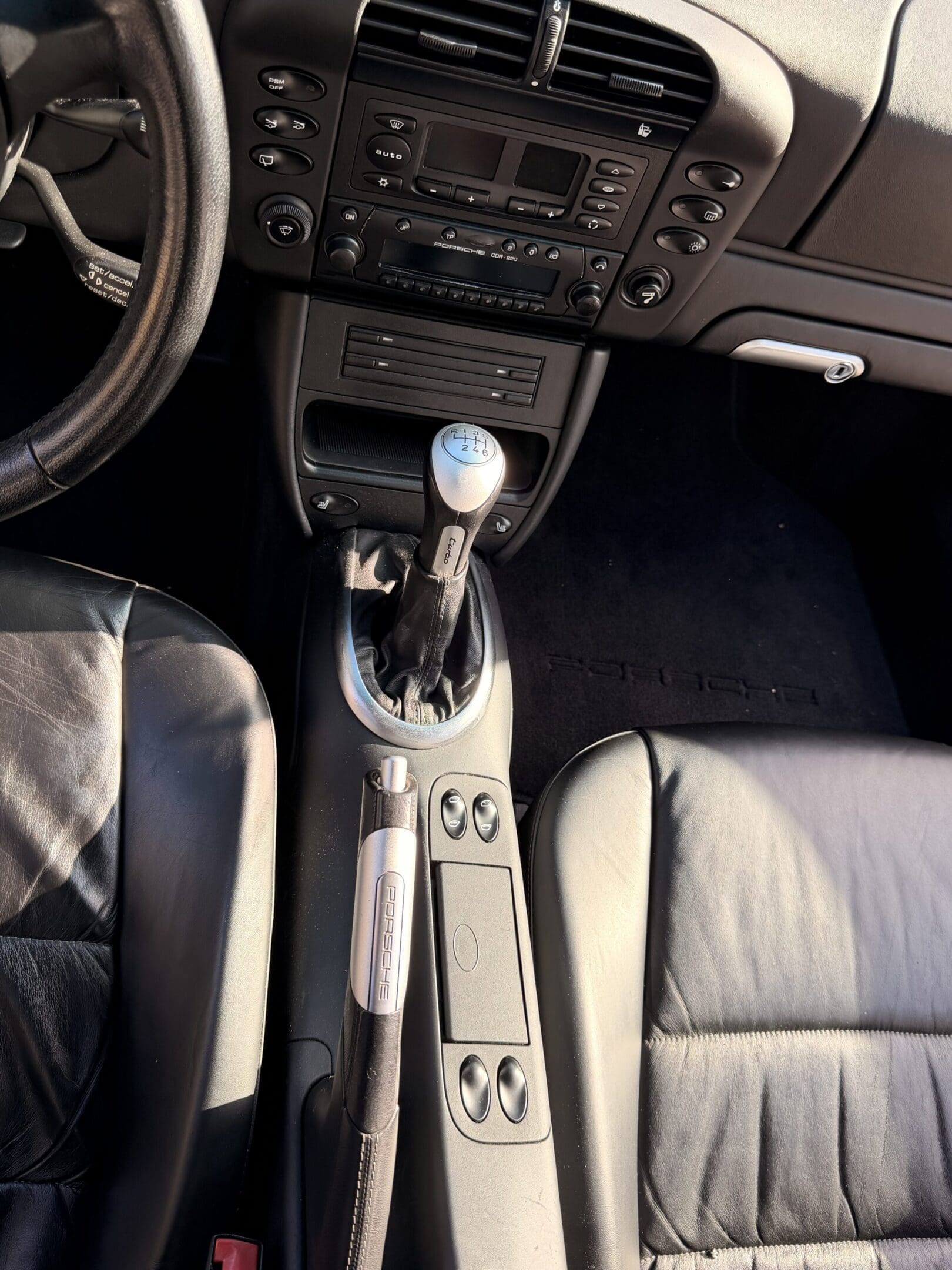 Car interior center console with manual shifter