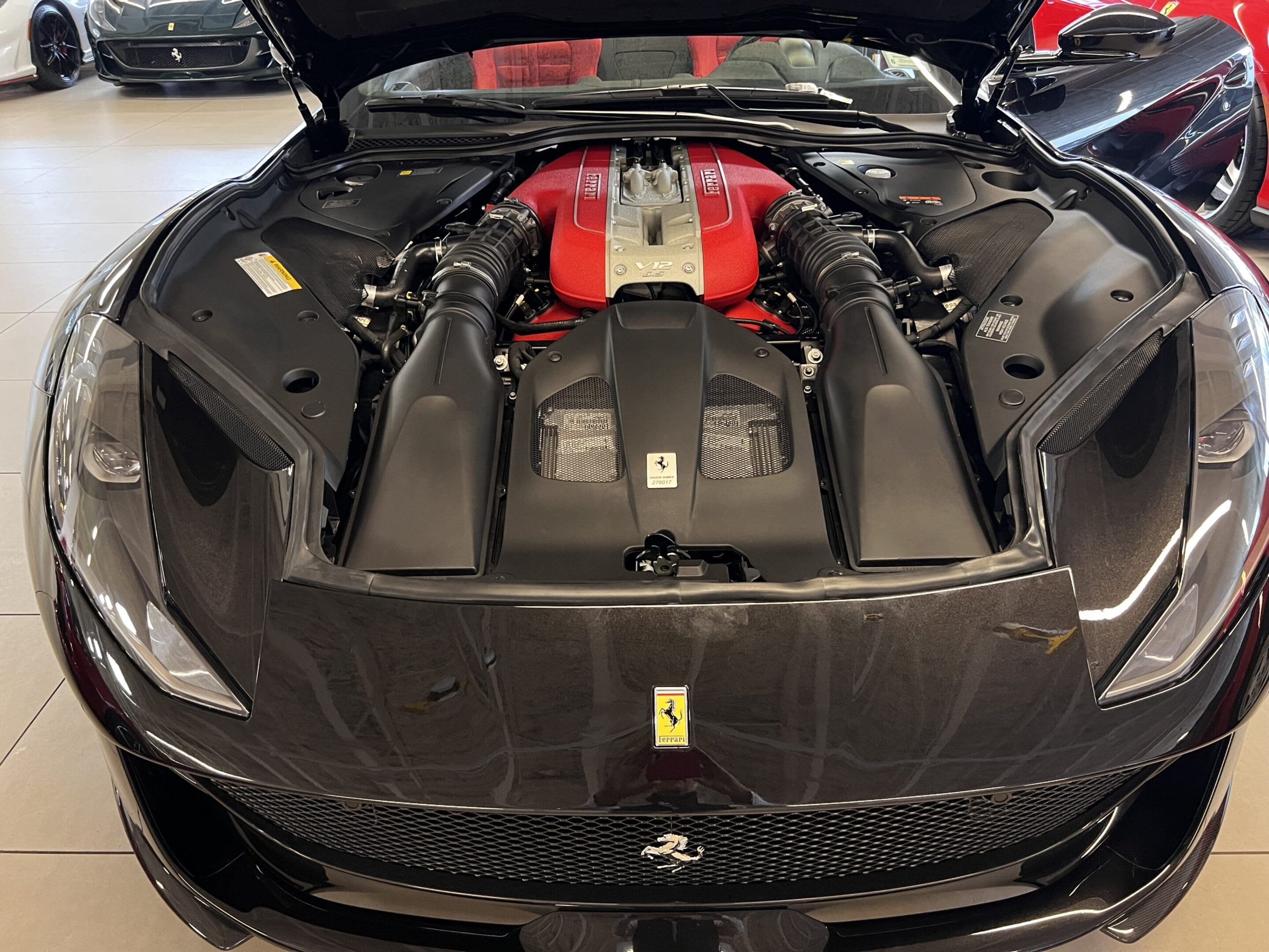 Ferrari V12 engine bay with hood open